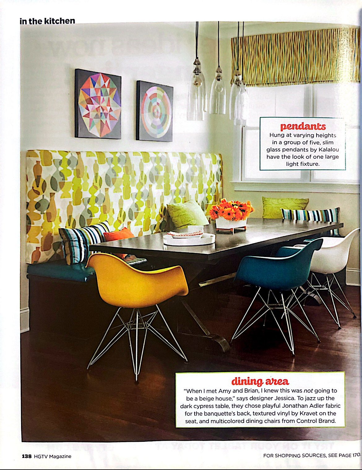 HGTV Magazine page showing a banquette dining nook with patterned upholstery, colorful molded chairs and a cluster of glass pendants